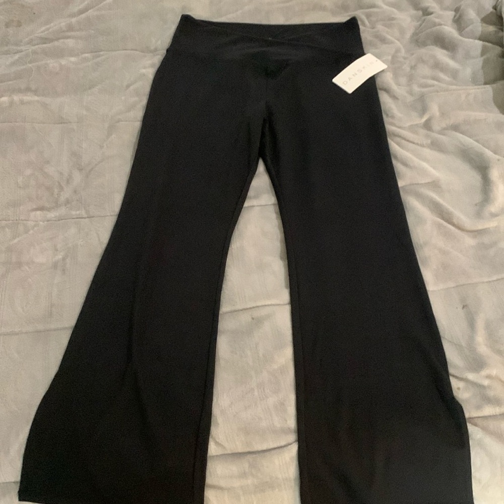 Black Danskin yoga pants.